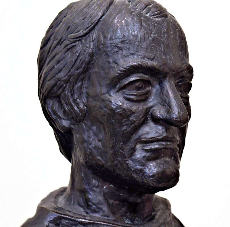 Bronze bust at the tomb of Fr. Gabriel Richard inside Ste. Anne de Detroit Church.