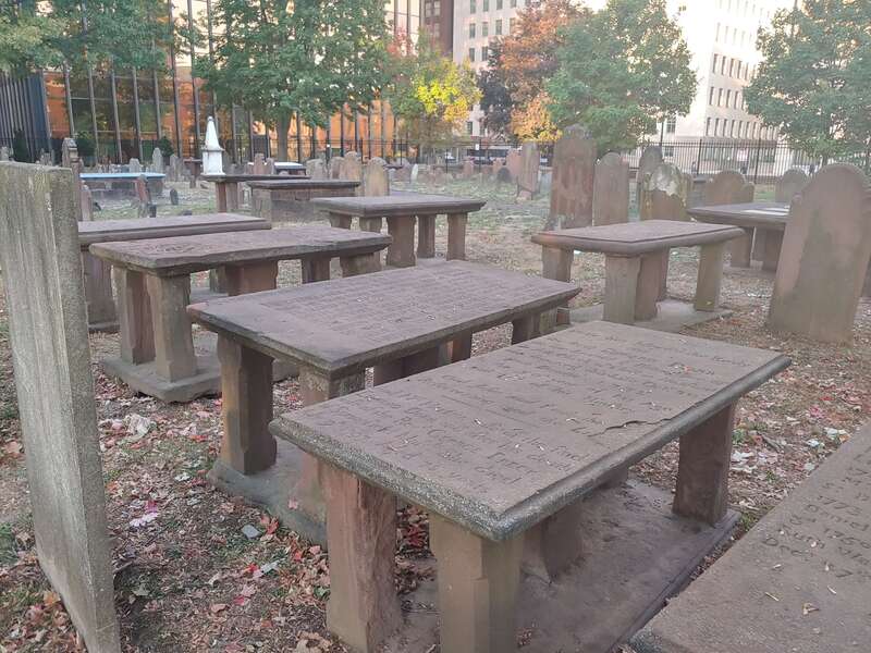 Collection of Brownstone Table style grave markers in the Ancient Burying Ground of Hartford