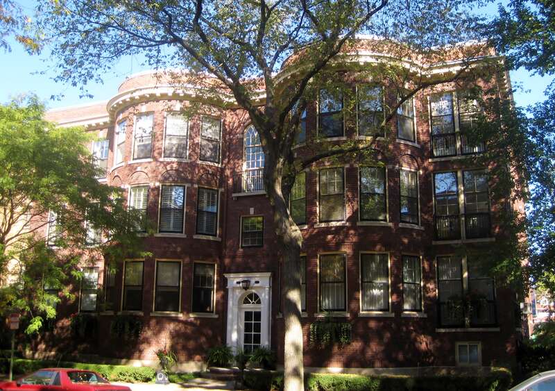 The Building at 923-925 Michigan Avenue in Evanston (1916). Baird &amp;amp; Warner featured it in their 1928 book, A Portfolio of Fine Homes. The architect, Robert de Goyler, who also designed many other north side apartments, lived in one of the rooms