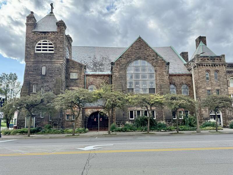 Built in 1899, this Richardsonian Romanesque Revival-style building was designed by Elijah E. Myers for the congregation of the Central Methodist Episcopal Church of Lansing, founded in 1845, and was expanded with the addition of an educational wing