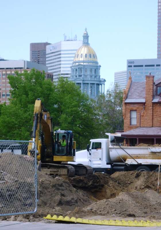 DENVER - booming in 2017.  On historic Capitol Hill a 3-story office building from back in the 20th cenntury is demolished and replaced with a 7-story apartment building, with ground floor retail.  Developers race to meet the needs of the Millennial