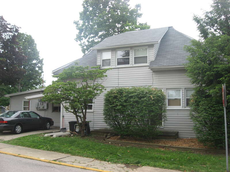 Front of the house located at 100 E. Cottage Grove Avenue in Bloomington, Indiana, United States.  Built in 1915, it is part of the locally-designated Cottage Grove Historic District.