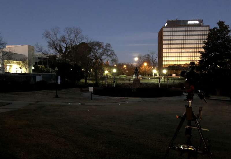 Downtown, looking westward at the moon