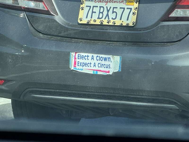 Bumper sticker reading "Elect A Clown, Expect A Circus" in Petaluma, Calif.