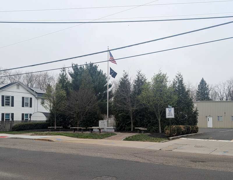 Photo of the Englishtown, New Jersey veterans memorial. The site was previously the home of the Union Hotel. Photo taken from County Route 522 (Tennent Avenue) looking southwest across CR 527 (Main Street).
