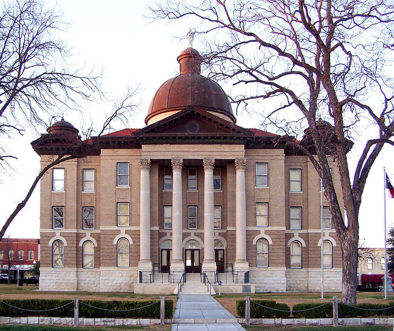 The Hays County Courthouse in San Marcos, Texas, United States. The courthouse was built in 1909 using the eclectic style of architecture and was listed on the National Register of Historic Places on May 23, 1980.