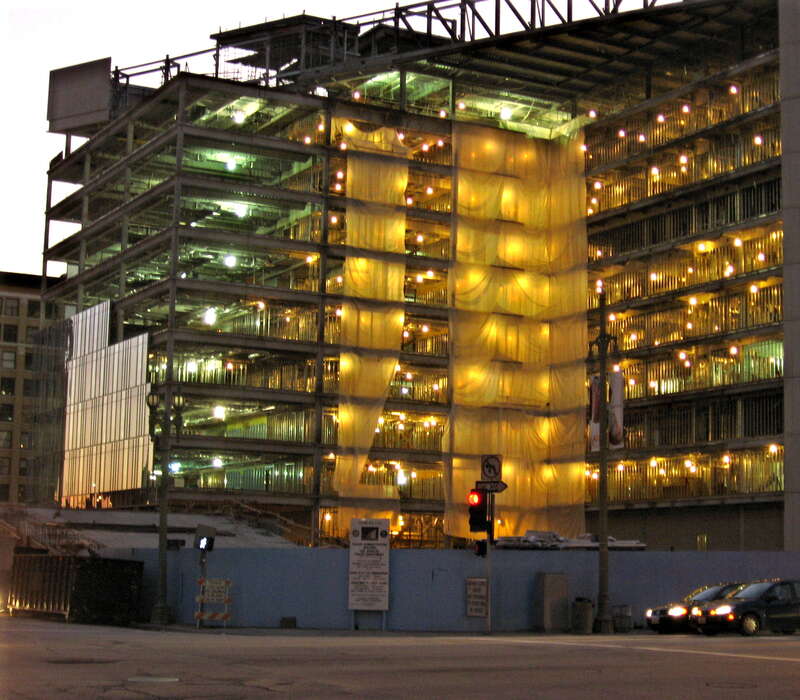 Gas discharge lamps lighting a building under construction