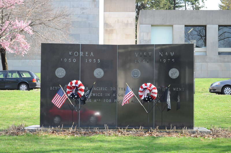 Korea and Vietnam War monument, Veterans Memorial Green, Washington Terrace Park, Middletown, Connecticut, USA. Part of the Washington Street Historic District, which is listed on the National Register of Historic Places. In foreground here is Vine