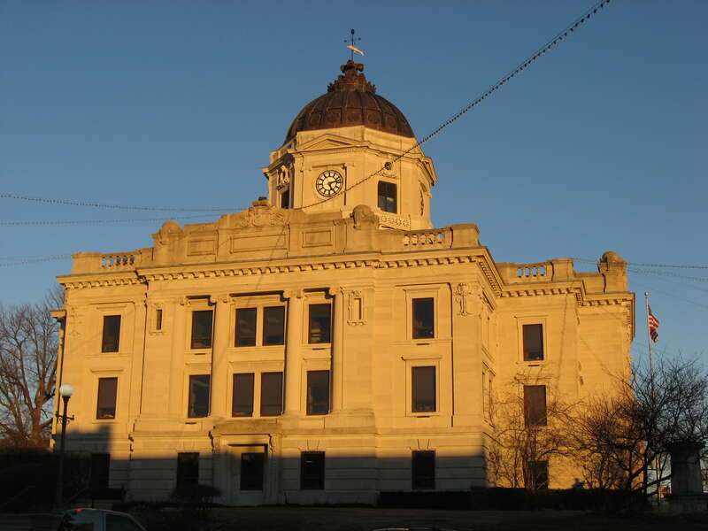 View from the southwest of the Monroe County Courthouse, located on Courthouse Square in downtown Bloomington, Indiana, United States.  Built in 1910, it is listed on the National Register of Historic Places, and it is part of the Register-listed