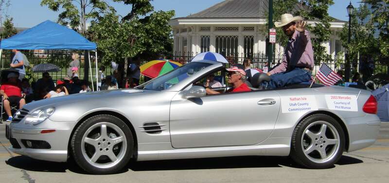 Utah County Commissioner Nathan Ivie on a 2003 Mercedes-Benz E-Class in the Freedom Festival Grand Parade.