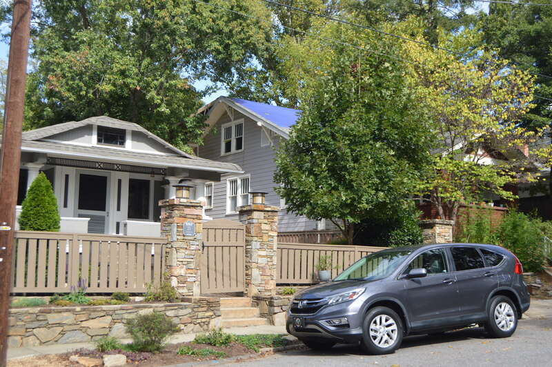 Houses on the northern side of Norwood Avenue at its intersection with Ramoth Road in Asheville, North Carolina, United States.  Built in 1935 (left) and 1923 (right), they are part of the Norwood Park Historic District, a historic district that is