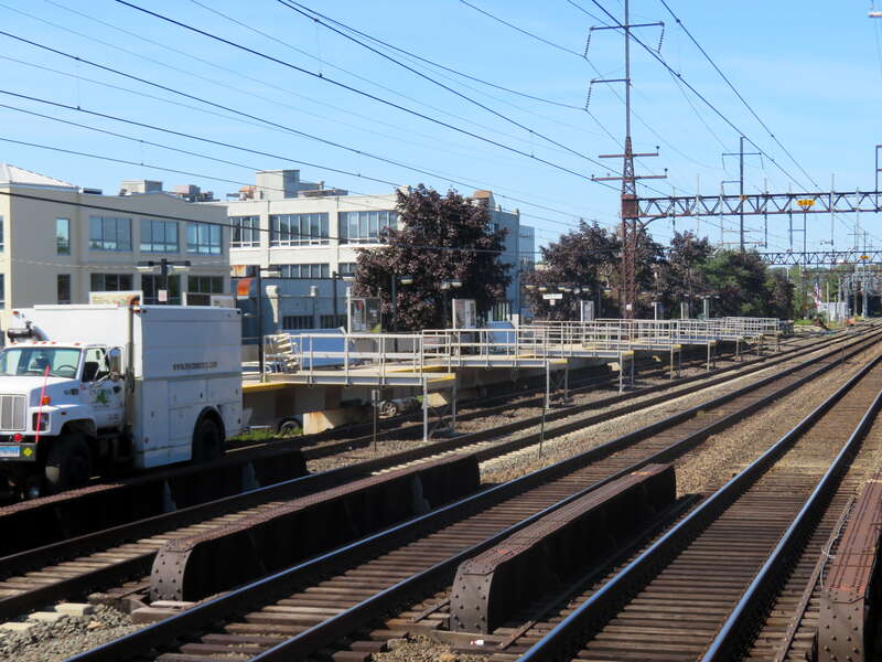 Platform bridges on the eastbound platform at East Norwalk station in September 2018. One track was out of service for catenary replacement.