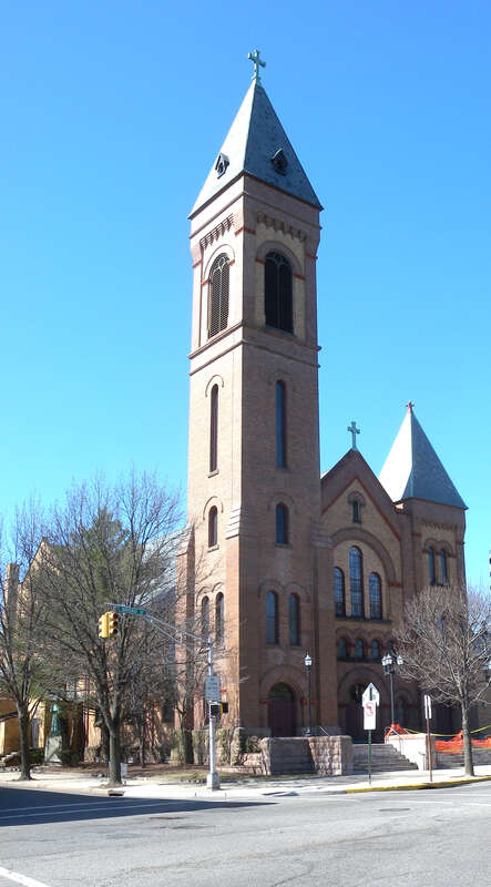 Looking northwest across Broad Street at Sacred Heart Church on a sunny early afternoon.