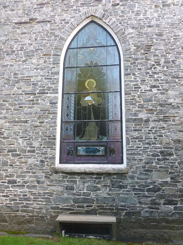 A stained glass window on the east side of the chapel of Saint Anne's Episcopal Church.  Located at 8 Kirk Street, Lowell, Massachusetts.