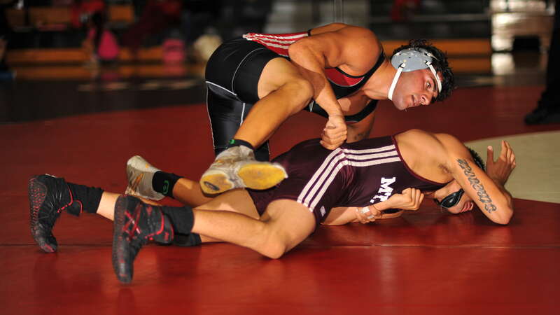 Shervin Iraniha steps over Jose Rugama to get into a better position while keeping control of Rugama's left arm.
157# Shervin Iraniha (Palomar College) MAJ DEC Jose Rugama  (Mt San Antonio College) MAJ DEC 12-3

BIV_9017_cr