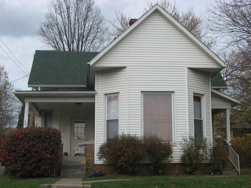 Front of the house located at 113 E. Tenth Street in Bloomington, Indiana, United States.  Built in 1910, it is part of the locally-designated Cottage Grove Historic District.