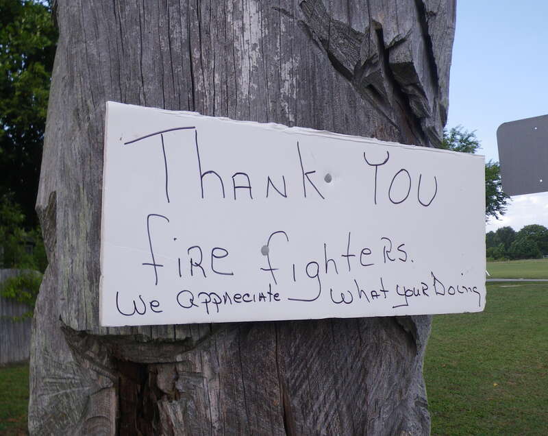 Suffolk, VA, August 2011.  A sign thanking firefighters of the Lateral West Fire is posted near the Virginia/North Carolina border.  At the peak of the fire, over 450 firefigthers worked to put out the 6,300-acre fire burning in Great Dismal Swamp.
