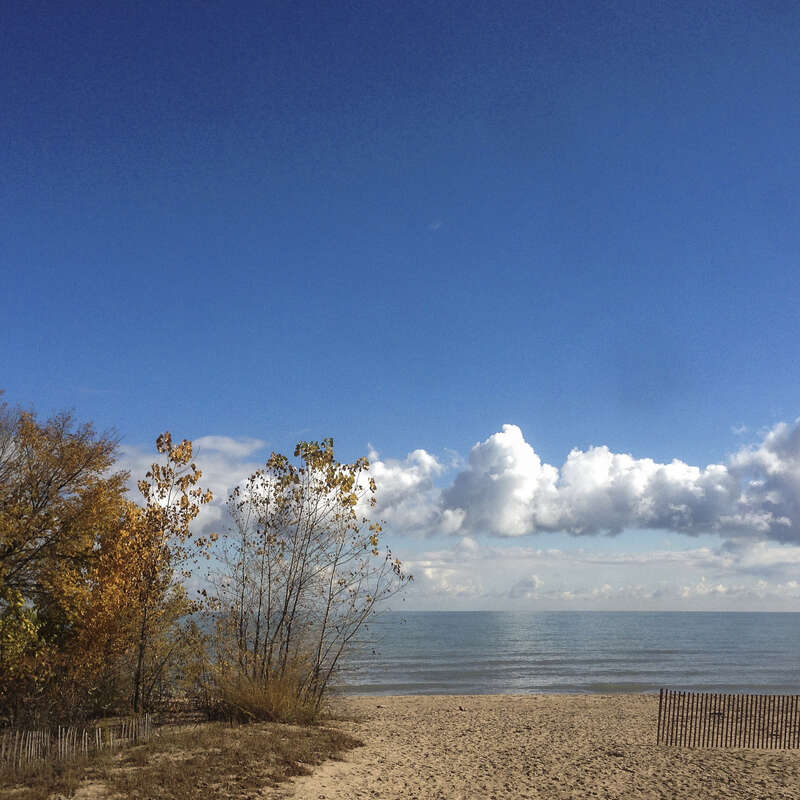 500px provided description: A beautiful day in early November shows signs of the changing seasons at Lee St Beach in Evanston, IL. [#autumn ,#beach ,#clouds ,#lake michigan ,#evanston]