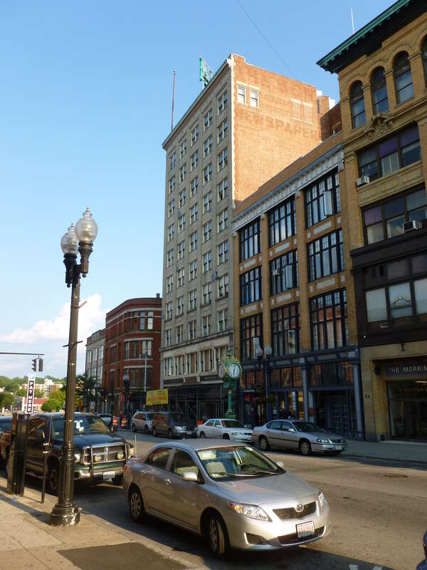 The Lowell Sun building, located at 491 Dutton Street, Lowell, Massachusetts.  Viewed from Merrimack Street; north and west sides of building shown.