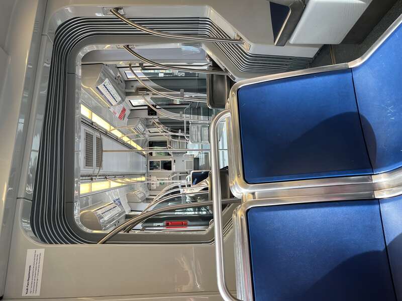 A photograph of the one of the ends of the Siemens S70 light rail vehicles used in Norfolk, Virginia from the middle back. Each side is a duplicate of each other.