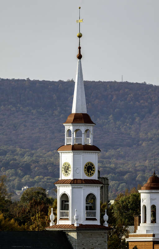 The spire of Trinity Chapel, with Catoctin Mountain behind, Frederick, Maryland, USA