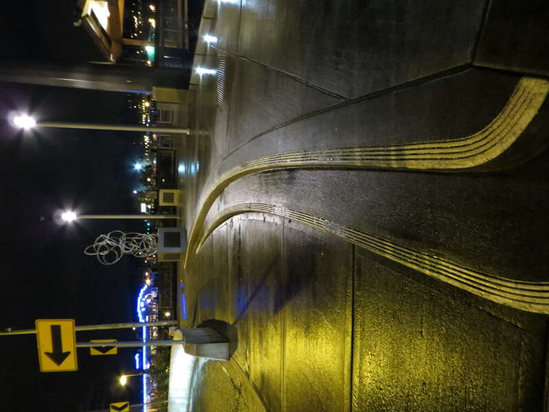 Lights and sidewalk along West Bay.
