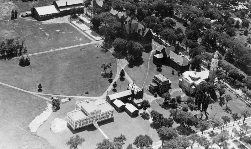 Aerial of the back of University Row at the University of Vermont, 1931.  Ira Allen Chapel (far right), Fleming Museum (lower left), Billings Library, Williams Hall, &amp;amp; Old Mill (upper center).