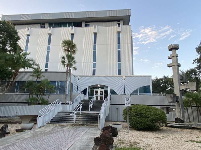 Constructed in 1968 and later expanded in 1976, the St. Petersburg Judicial Building stands at five stories tall. It is made from textured concrete, a material choice that contributes to its architectural acclaim. One of the building's standout