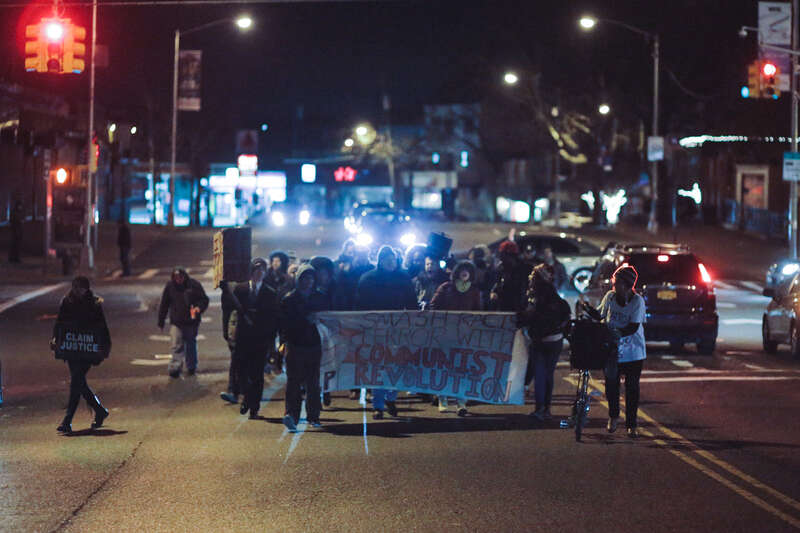 500px provided description: Tompkinsville, Staten Island, NY
December 19, 2014

Protestors march towards the Staten Island Supreme Courthouse after convening at the site of Eric Garner's death. [#march ,#protest ,#blm ,#black lives matter