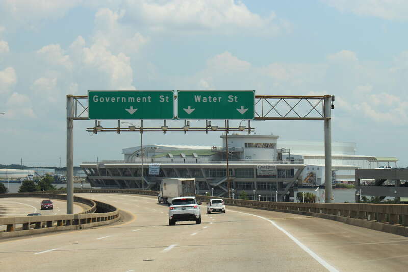Interstate 10 EB Exit 26B offramp Government St Water St signage with GulfQuest National Maritime Museum of the Gulf of Mexico in the background, Mobile, Mobile County, Alabama
