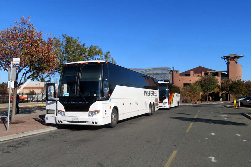 Amtrak Thruway Motorcoach buses at Martinez station in November 2019. One bus will head to Napa via Vallejo, and the other to Arcata via Santa Rosa.