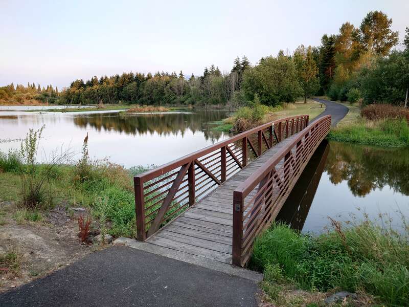 Bridge crossing a creek in Beaverton Creek Wetlands Natural Area in Beaverton, Oregon