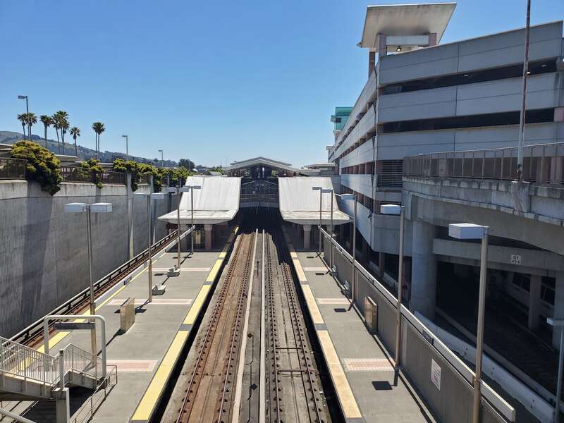 Colma station viewed from the northwest garage entrance in July 2023
