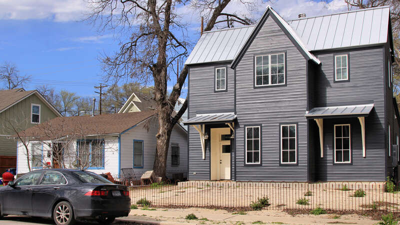 Image shows the gentrification of the once largely Hispanic area of East Austin on Holly Street.