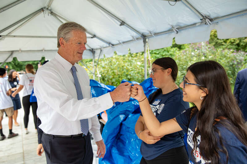&quot;Governor Charlie Baker and First Lady Lauren Baker join state and local officials to make care packages for members of the military with the Massachusetts Military Heroes Fund and Project 351 in Boston on Sept. 11, 2022.&quot;