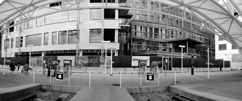 500px provided description: Halfsies [#downtown ,#buildings ,#train ,#architecture ,#building ,#bright ,#black and white ,#white ,#monochrome ,#black ,#dark ,#panorama ,#station ,#grainy ,#noise ,#track ,#construction ,#work ,#colorado ,#grain