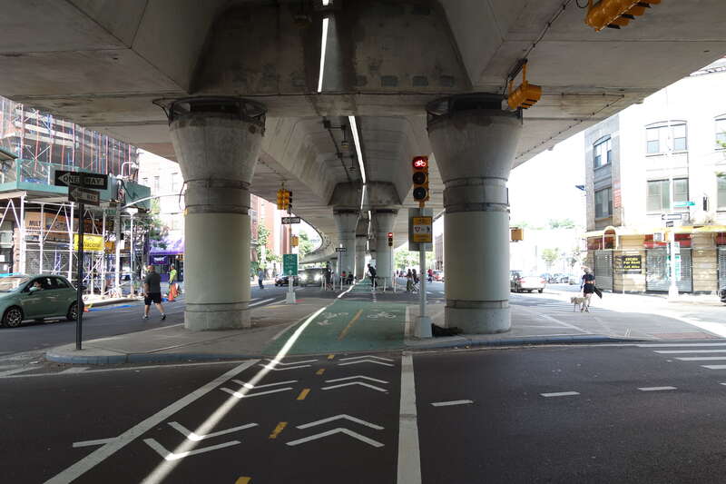 Looking from LaGuardia Playground South at the elevated highway spur running from the Williamsburg Bridge to the Brooklyn-Queens Expressway, at Havemeyer Street and South 4th Street in Williamsburg, Brooklyn. Note the cycleway in the center of the
