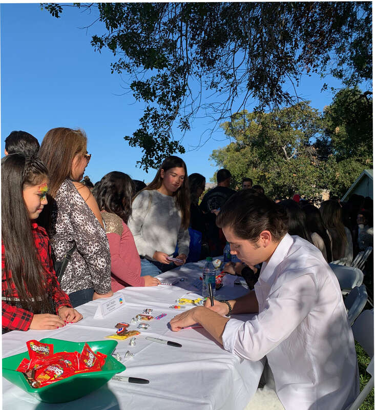 Jake T Austin at a charity signing for Ronald McDonald House in Burbank, CA Dec 2017
