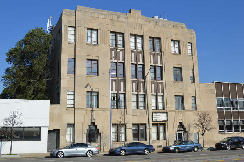 Front and western side of a good Art Deco commercial building, the former headquarters of the Detroit Saturday Night newspaper, located at 1959 E. Jefferson Avenue in Detroit, Michigan, United States.  It was built in 1929.