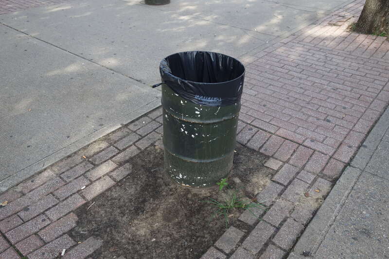 Walking through the sitting plaza at the east end of LaGuardia Playground South, at the northwest corner of Havemeyer Street and South 5th Street in Williamsburg, Brooklyn. The park was originally the northern half of the Williamsburg Bride Plaza
