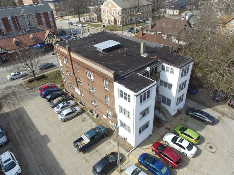 An aerial view of the existing 3-story apartment building in Urbana, IL being renovated as part of the 2016 Race to Zero project.