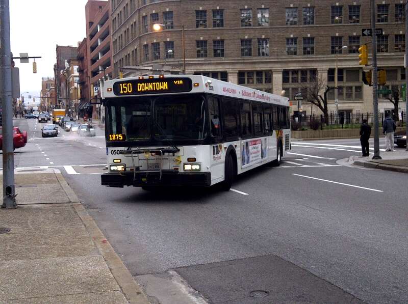 MTA Maryland New Flyer bus #5011 on the #150 Line turning onto East Baltimore Street from North Liberty Street.