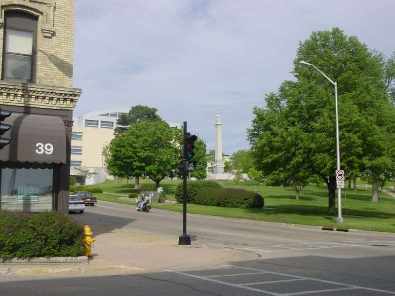 Continuing the Janesville tour, the Rock County Courthouse can be seen up the hill.  We're on Main Street looking at the intersection of Main and Court.