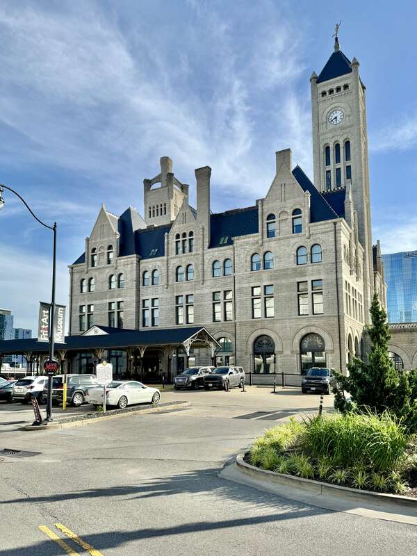 Built in 1898-1900, this Richardsonian Romanesque Revival-style building was designed by Richard Montfort to serve as a Union Railroad Station for the city of Nashville.  The building is clad in rough-hewn stone with roman arched bays on the first