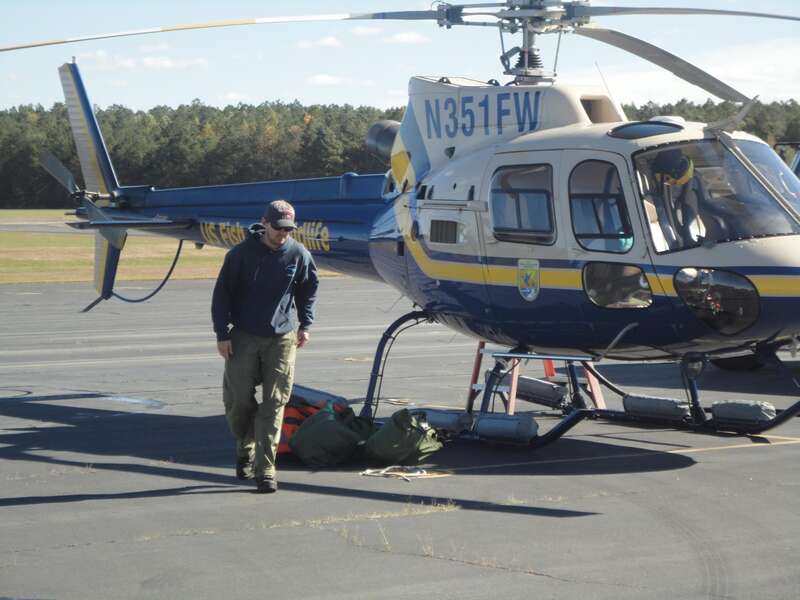 A U.S. Fish and Wildlife Service staff member is preparing to help gather aerial images to assess storm impacts at Service stations that are in the hurricane affected areas. 
Credit: USFWS

Stay