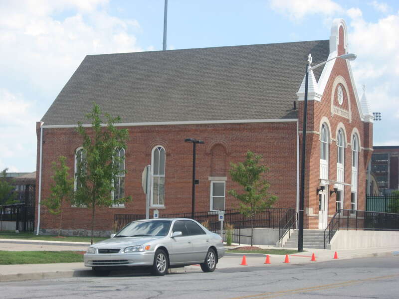 Northern side and front of the former B'nai Israel Synagogue, located at 420 S. William Street in South Bend, Indiana, United States.  Built in 1901 and now a gift shop for the adjacent Stanley Coveleski Regional Stadium, it is listed on the National