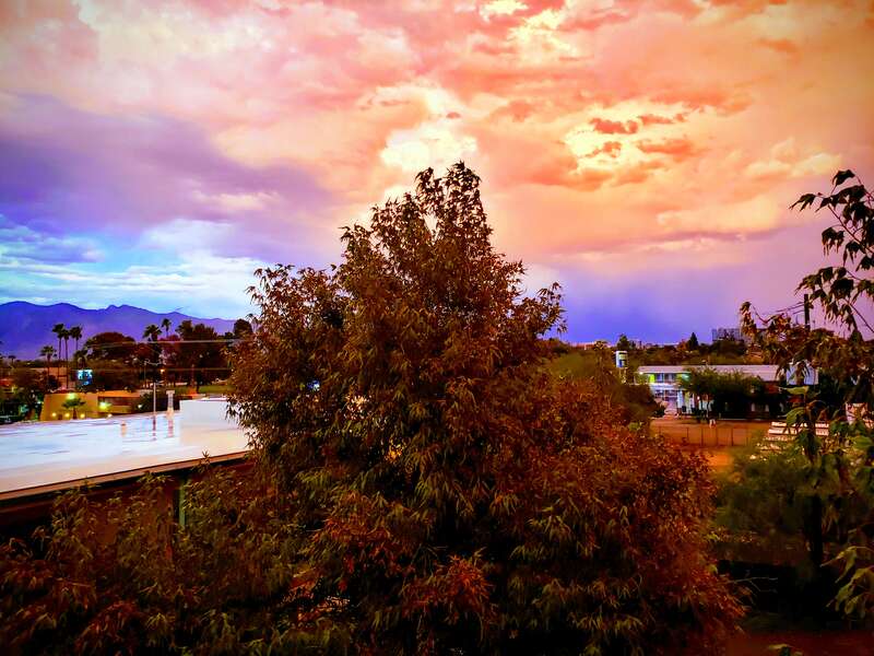 This photo is automatically created and modified by Google Photos. It shows a great view of the sky during a stormy day.