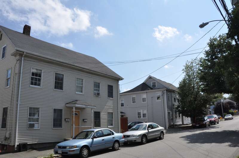 A street view of the Charles Street Workers' Housing Historic District in Waltham, Massachusetts.