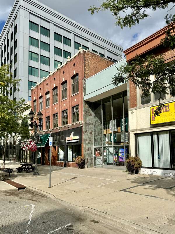 Built in the late 19th Century and early 20th Century, these buildings are characteristic of the buildings that can be found in Downtown Lansing.  The buildings are contributing structures in the Lansing Downtown Historic District, listed on the