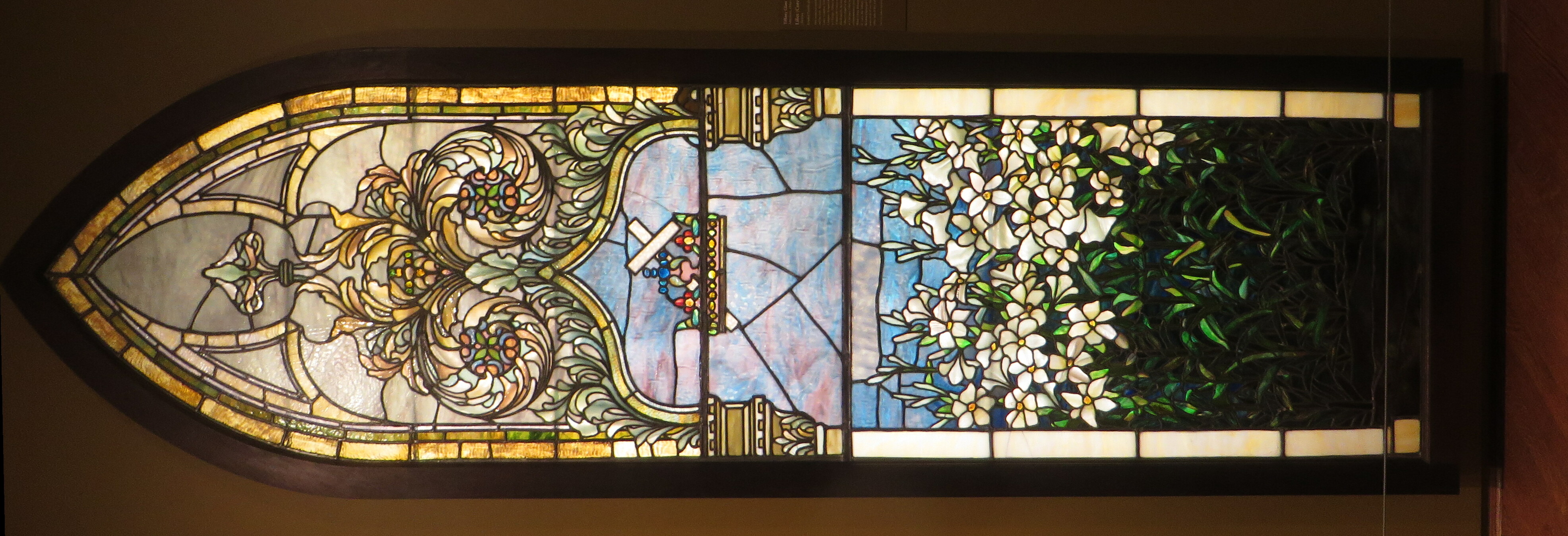 This memorial window, dedicated to Francis Edwin Corey and his wife, Vernera Leonard Corey, is one of several that Louis Comfort Tiffany’s Tiffany Glass and Decorating Company designed for Christ Reformed Episcopal Church in Chicago. Tiffany used